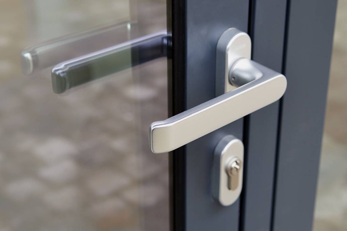 Exterior door handle and Security lock on Metal frame - Low deep of field